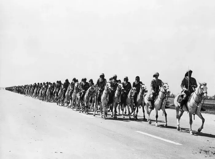 Framed Print : Line of Iraqi Cavalry on Road in Desert Framed Print : Line of Iraqi Cavalry on Road in Desert