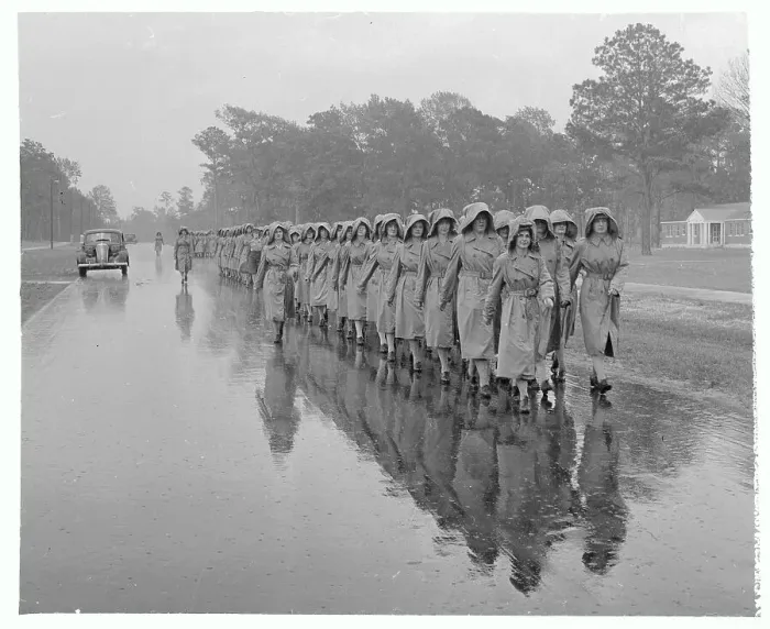 Framed Print : Line of Women Soldiers Marching on Road Framed Print : Line of Women Soldiers Marching on Road