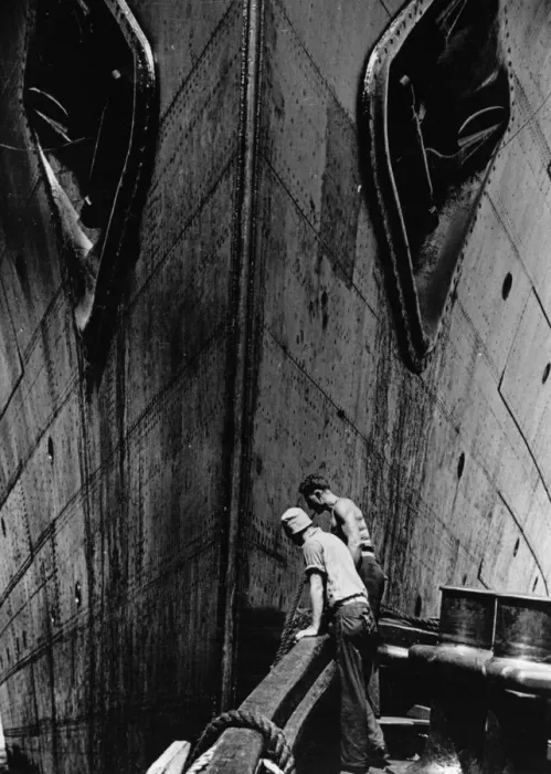 Framed Print : Liner Bow. A dramatic close-up of the bow of a liner at New York Docks, from a tug