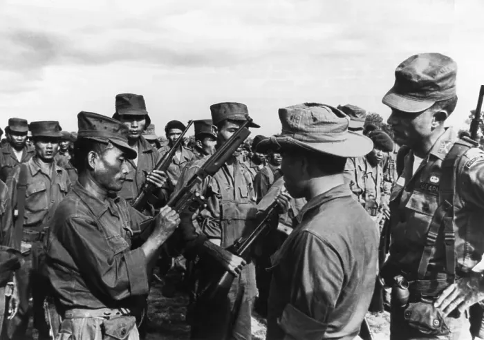Framed Print : Linton Beasley Checking Rifle Squad