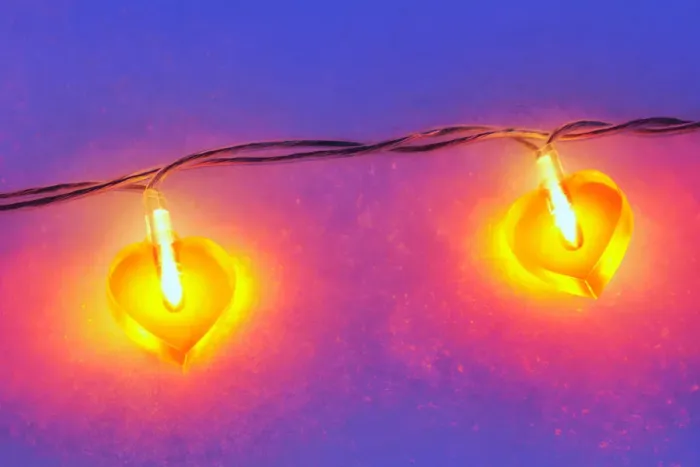 Framed Print : Lit heart-shaped fairy lights in the snow Framed Print : Lit heart-shaped fairy lights in the snow