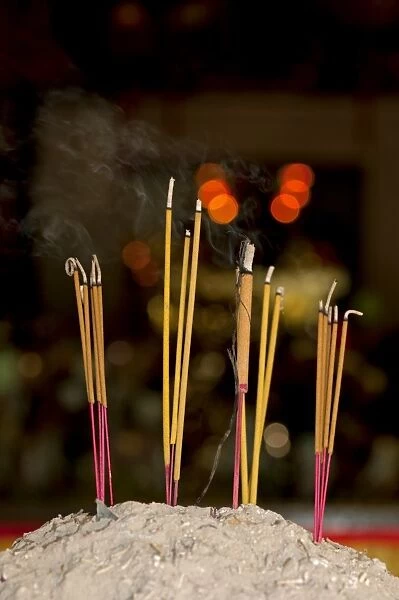 Lit incense sticks, Wat Phnom Temple, Phnom Penh, Cambodia, Southeast Asia