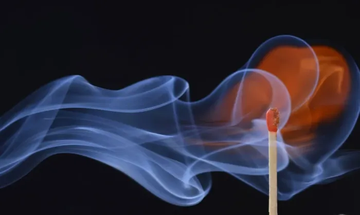 Framed Print : Lit matchstick with a flame and smoke, Germany Framed Print : Lit matchstick with a flame and smoke, Germany