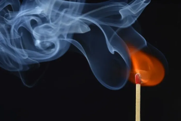 Framed Print : Lit matchstick with a flame and smoke, Germany