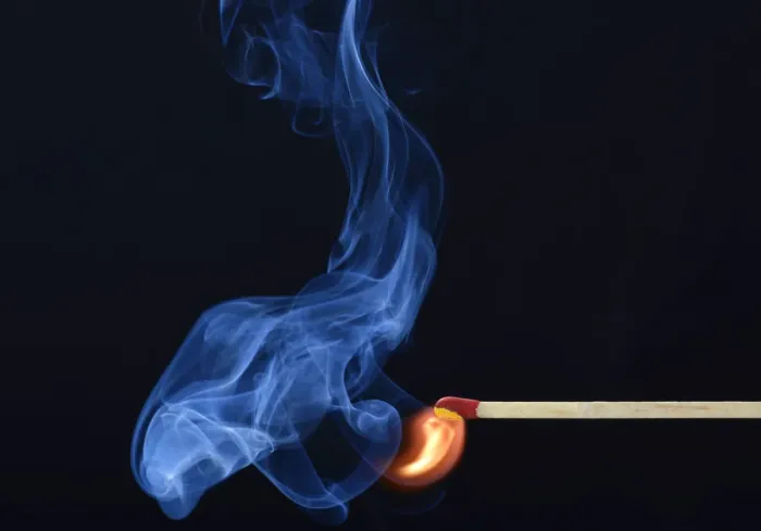 Framed Print : Lit matchstick with a flame and smoke, Germany Framed Print : Lit matchstick with a flame and smoke, Germany