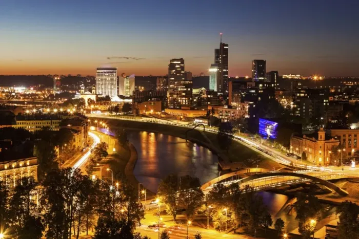 Framed Print : Lithuania, Vilnius, Illuminated riverfront cityscape seen from elevation on opposite bank Framed Print : Lithuania, Vilnius, Illuminated riverfront cityscape seen from elevation on opposite bank