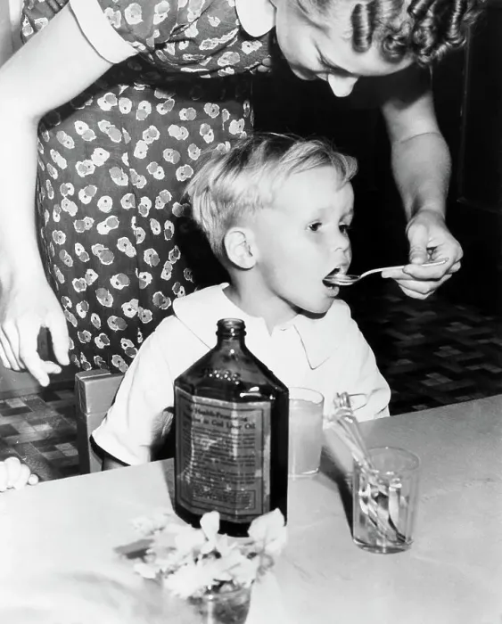 Framed Print : Little Boy Getting Dose of Cod Liver Oil Framed Print : Little Boy Getting Dose of Cod Liver Oil