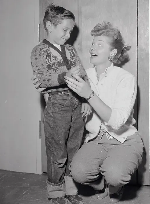 : Little Boy Giving Donation to Lucille Ball : Little Boy Giving Donation to Lucille Ball