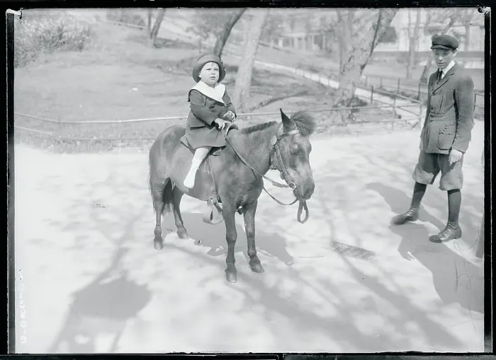 Framed Print : Little Boy Riding Pony