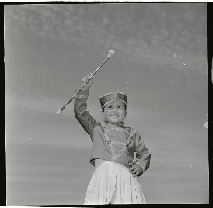 Framed Print : Little Girl Holding Baton in Air Framed Print : Little Girl Holding Baton in Air
