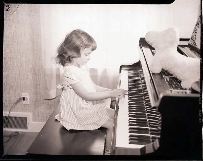 Framed Print : Little Girl Playing the Piano Framed Print : Little Girl Playing the Piano