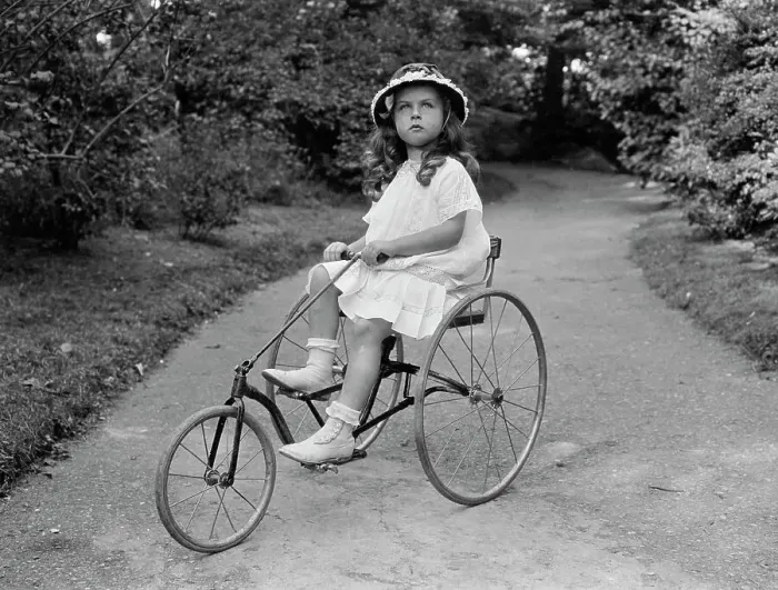 Framed Print : Little Girl Riding Tricycle Framed Print : Little Girl Riding Tricycle