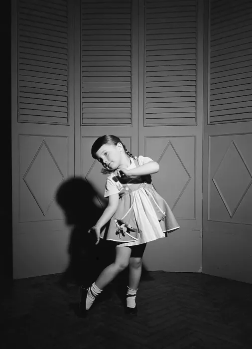 Framed Print : A little girl strikes a curiously dramatic pose against a screen backdrop, circa 1950. (Photo by H. Armstrong Roberts / Retrofile / Getty Images) Framed Print : A little girl strikes a curiously dramatic pose against a screen backdrop, circa 1950. (Photo by H. Armstrong Roberts / Retrofile / Getty Images)