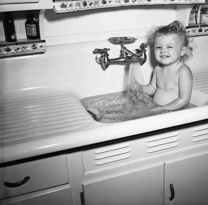 Framed Print : Little Girl Taking Bath in Kichen Sink Framed Print : Little Girl Taking Bath in Kichen Sink