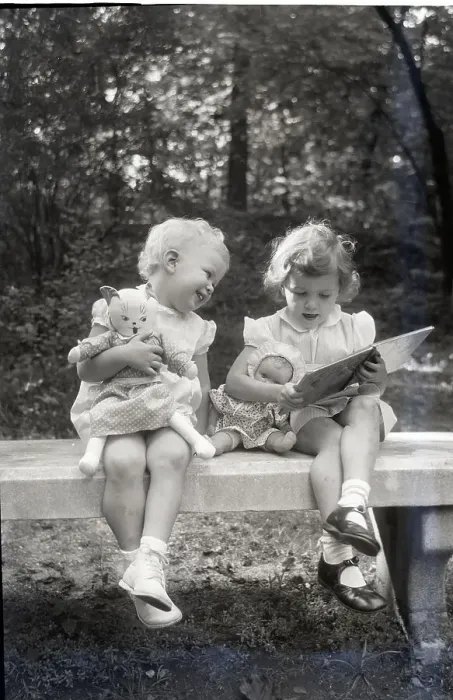 Framed Print : Two Little Girls Sitting On A Bench Framed Print : Two Little Girls Sitting On A Bench
