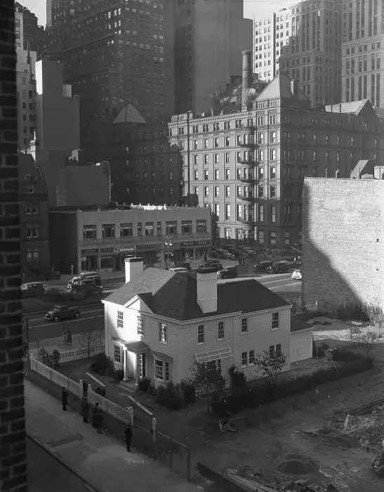 Framed Print : A Little Suburban Cottage Rises Among the Skyscrapers Framed Print : A Little Suburban Cottage Rises Among the Skyscrapers