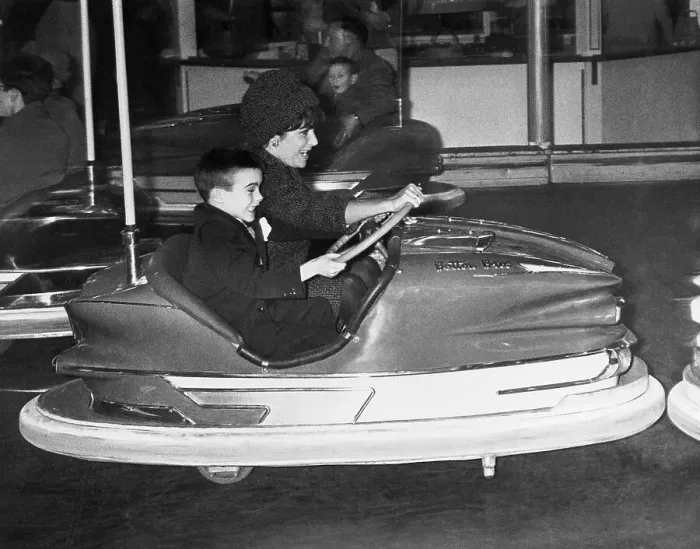 Framed Print : Liz Taylor and Son Michael Riding in Bumper Car Framed Print : Liz Taylor and Son Michael Riding in Bumper Car