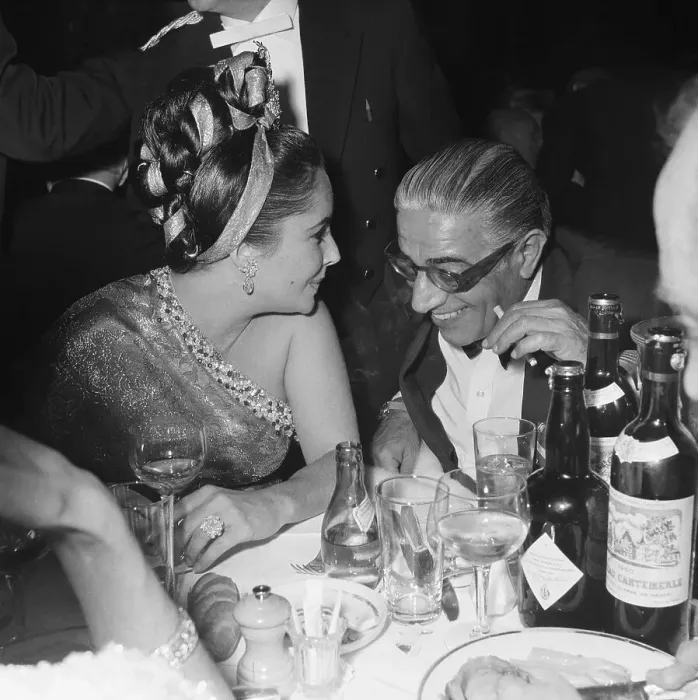Framed Print : Liz Taylor Whispers to Aristotle Onassis Framed Print : Liz Taylor Whispers to Aristotle Onassis