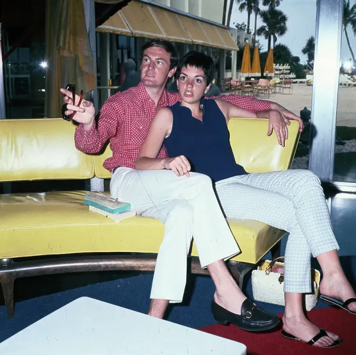 Framed Print : Liza Minelli and Peter Allen Sitting on Yellow Leather Sofa Framed Print : Liza Minelli and Peter Allen Sitting on Yellow Leather Sofa