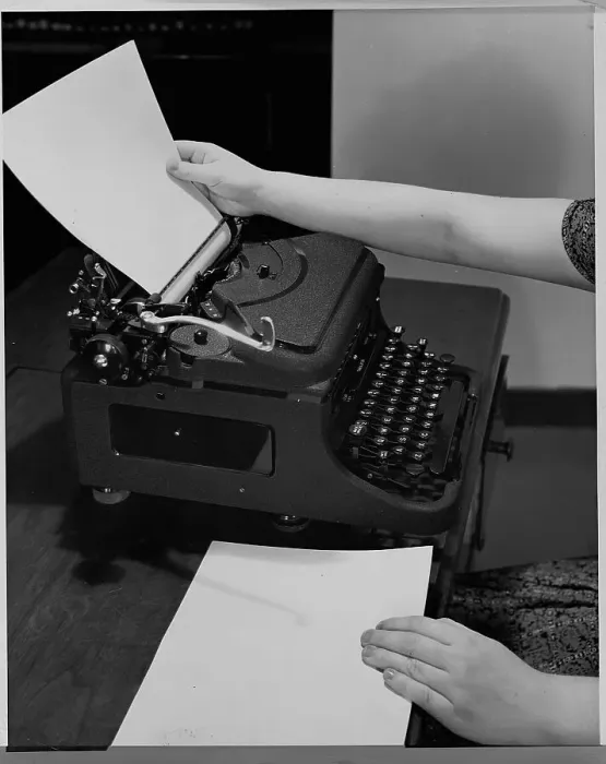 Framed Print : Loading Paper into Typewriter Framed Print : Loading Paper into Typewriter