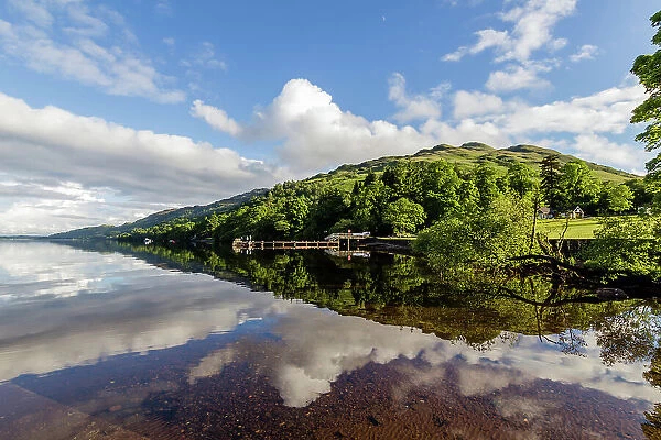 Loch Lomond in reflection on a sunny evening