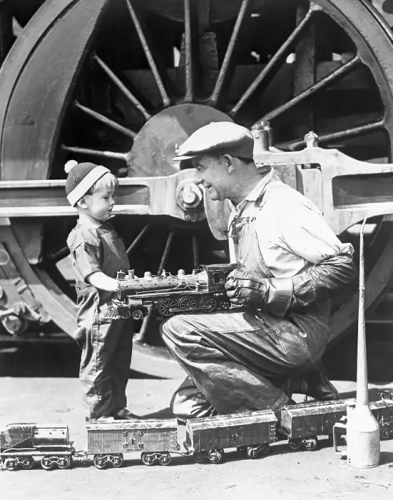 Framed Print : Locomotive Engineer Conversing with Young Boy