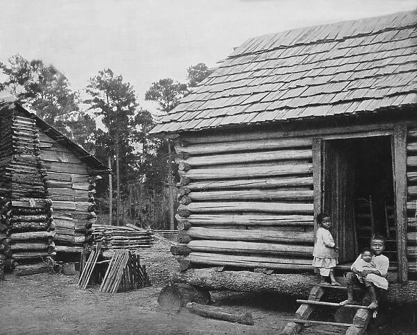 Log Huts. Log huts for black workers in Thomasville, Georgia