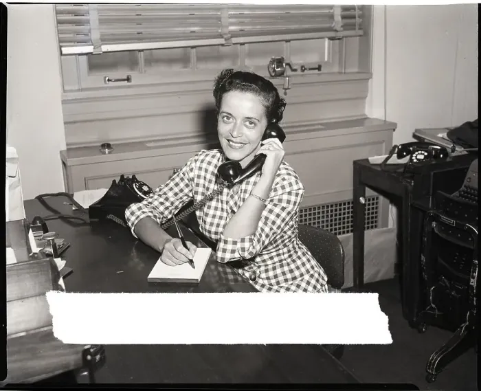 Framed Print : Lois Lippman Smiles While on the Phone