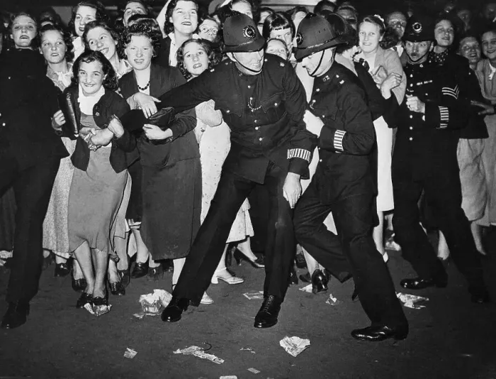 Framed Print : London Bobbies Restraining Female Crowd Framed Print : London Bobbies Restraining Female Crowd