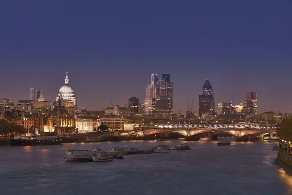 London skyline and river Thames at dusk, London, England, United Kingdom, Europe