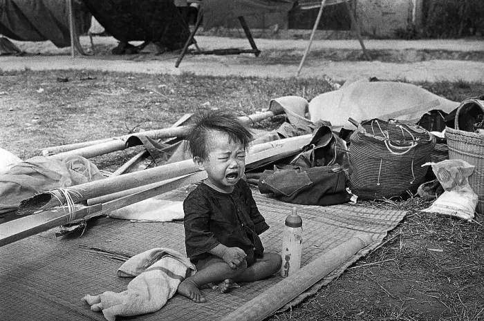 Framed Print : Lone Crying Child on Ground in Vietnam Framed Print : Lone Crying Child on Ground in Vietnam