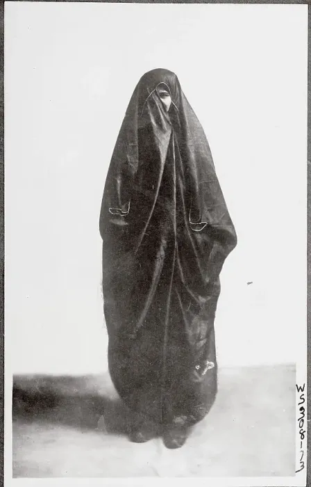 Framed Print : Lone Moslem Woman in Shrouded Attire Framed Print : Lone Moslem Woman in Shrouded Attire