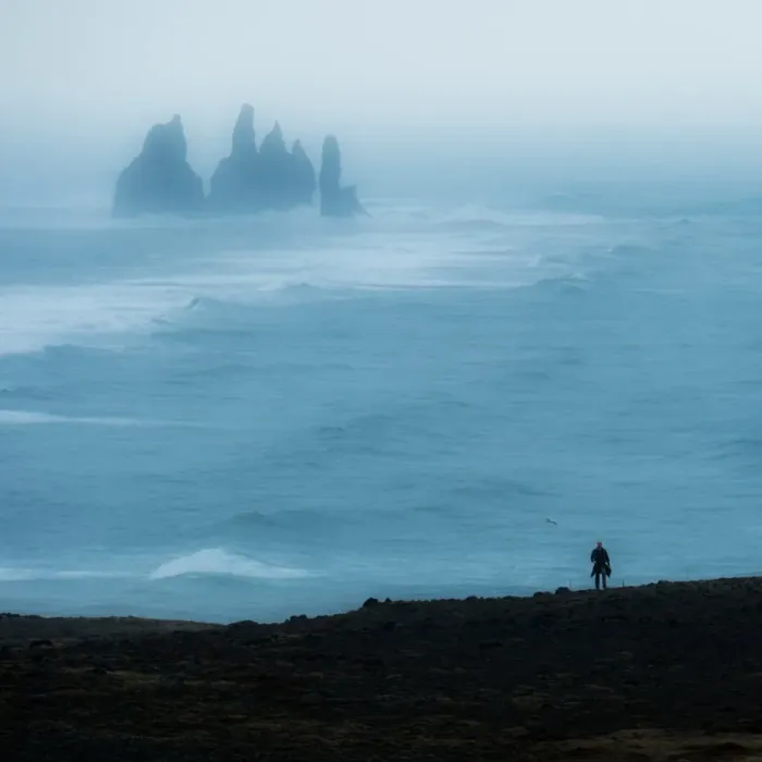 Framed Print : A lonely man and the unique rock of Vik, Iceland Framed Print : A lonely man and the unique rock of Vik, Iceland