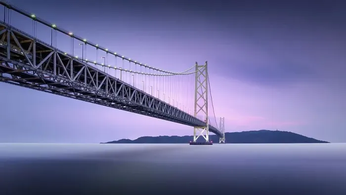 Framed Print : Long exposure of a colourful dusk at the illuminated Akashi Kaikyo Bridge, the longest suspension bridge in the world, in Kobe, Japan, Asia