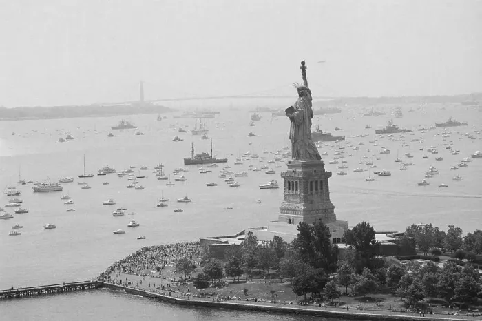 Framed Print : Long Line Of Ships Sails Past Statue Framed Print : Long Line Of Ships Sails Past Statue