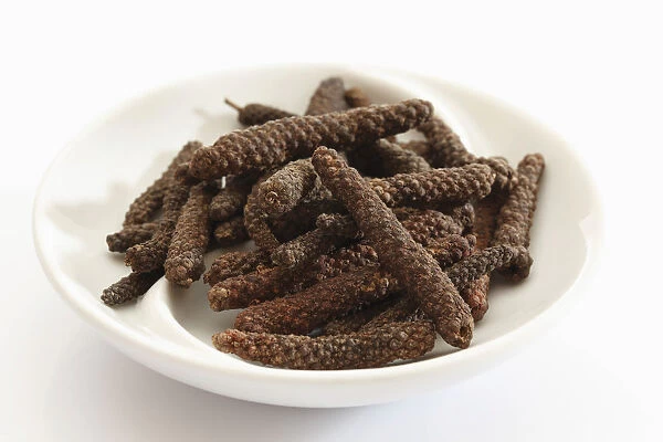 Long pepper in a small porcelain bowl