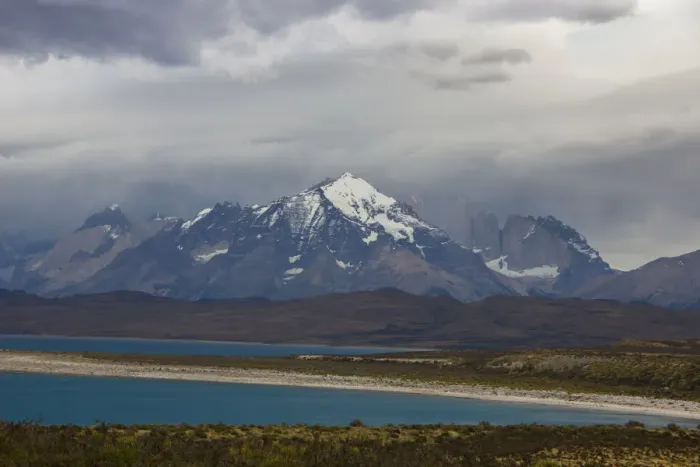 Framed Print : Looking across the turquoise waters of Lake Sarmiento to the snow-capped mountain peaks of the Torres del Paine National Park in the Magallanes Region of Patagonia, Southern Chile Framed Print : Looking across the turquoise waters of Lake Sarmiento to the snow-capped mountain peaks of the Torres del Paine National Park in the Magallanes Region of Patagonia, Southern Chile