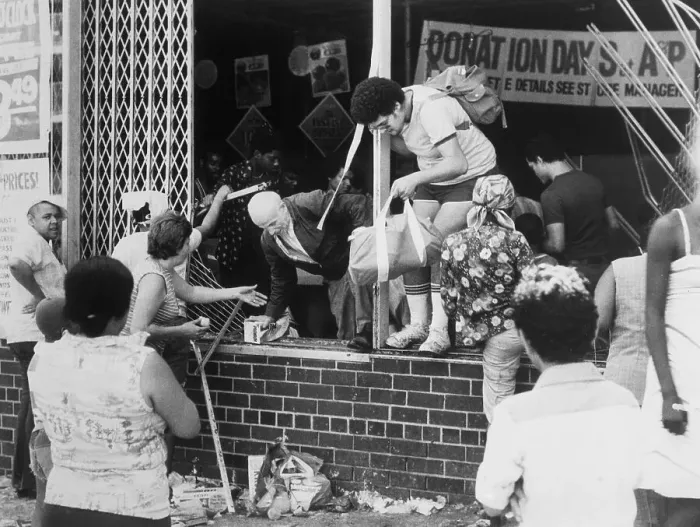Framed Print : Looters Breaking into Store Framed Print : Looters Breaking into Store