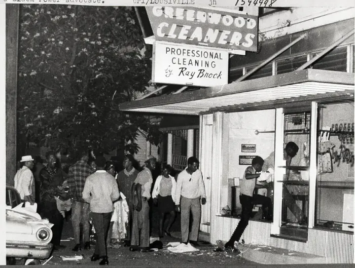Framed Print : Looters Entering Dry Cleaning Building Framed Print : Looters Entering Dry Cleaning Building