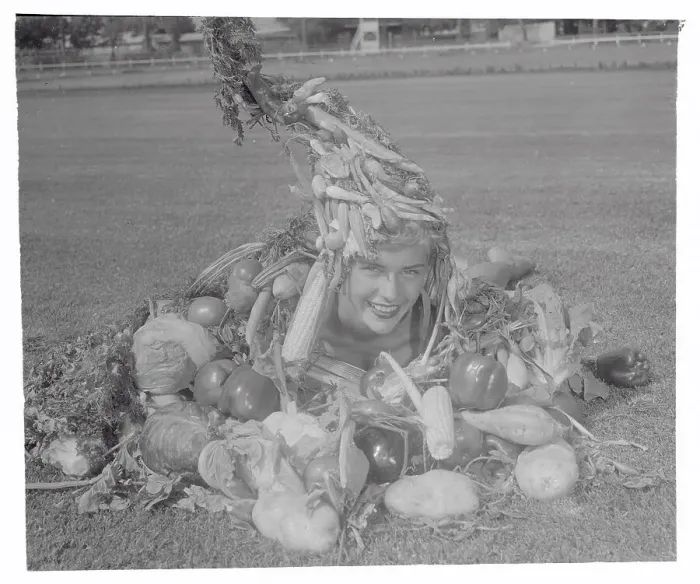 Framed Print : Loretta Kaiser Posing with Vegetables Framed Print : Loretta Kaiser Posing with Vegetables