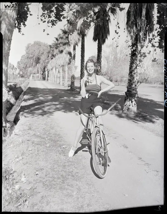 Framed Print : Loretta Young Bicycling in Palm Springs