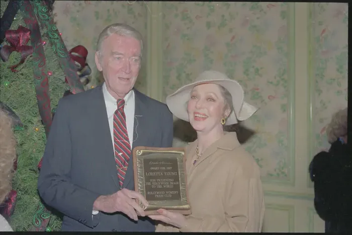 Framed Print : Loretta Young and Jimmy Stewart Holding Award Framed Print : Loretta Young and Jimmy Stewart Holding Award