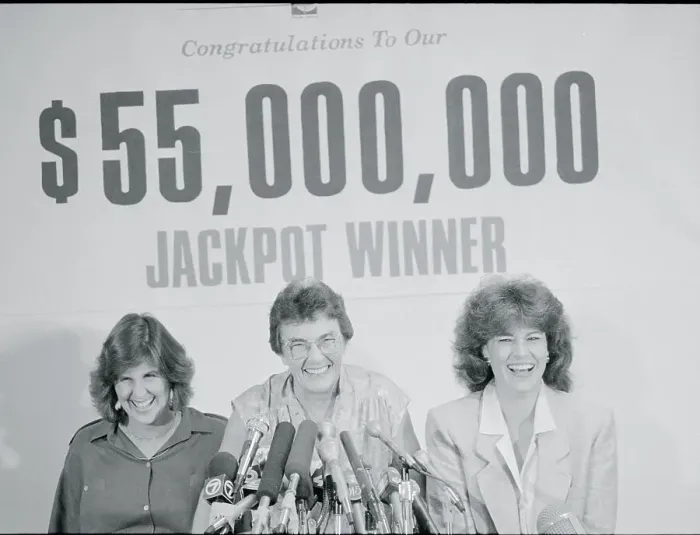 Framed Print : Lottery Winner and Others Conversing with Reporters