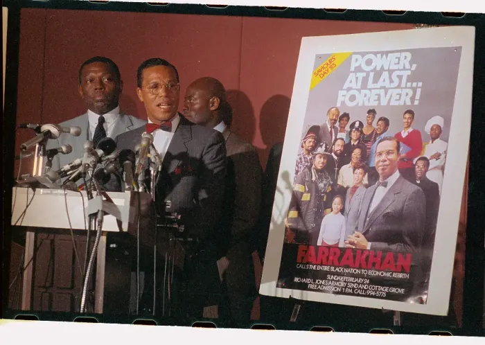 Framed Print : Louis Farrakhan Standing at Podium with Poster Framed Print : Louis Farrakhan Standing at Podium with Poster