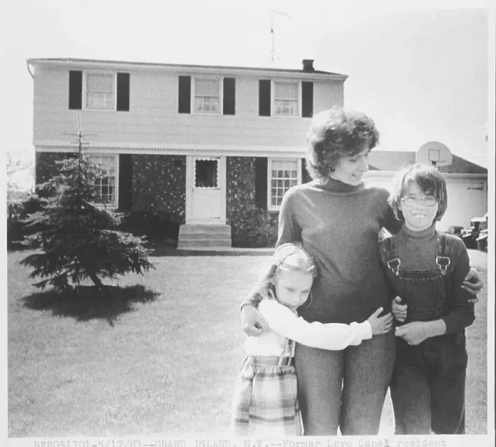 Framed Print : Former Love Canal Resident Hugging Her Daughters Framed Print : Former Love Canal Resident Hugging Her Daughters