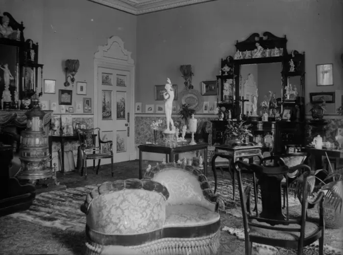 Framed Print : Love Seat. circa 1900: A Victorian drawing room, crammed with ornaments Framed Print : Love Seat. circa 1900: A Victorian drawing room, crammed with ornaments