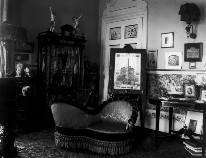 Framed Print : Love Seat. circa 1900: A love seat in a Victorian drawing room