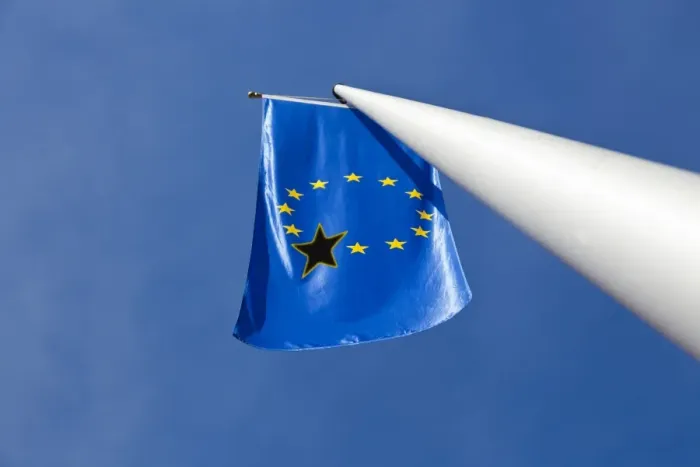 Framed Print : Low angle view of a European Union flag with one black star on it Framed Print : Low angle view of a European Union flag with one black star on it