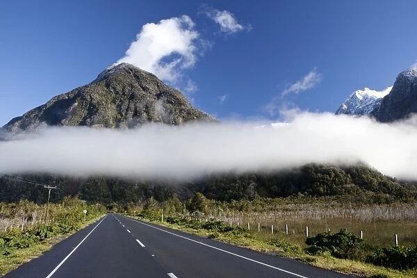 Low-hanging clouds moving through the Patagonian Andes over the Pan-American Highway, Carretera Austral, Ruta CH7, Region de los Lagos, Patagonia, Chaiten, Chile, South America, America