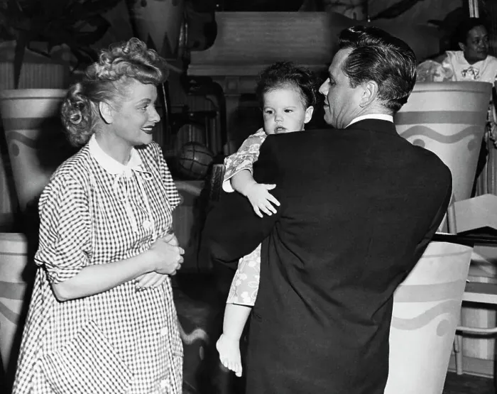 Framed Print : Lucille Ball, Desi Arnaz Holding Baby Framed Print : Lucille Ball, Desi Arnaz Holding Baby